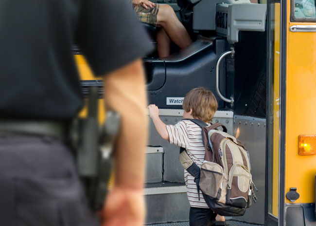 Cop Watching School Bus